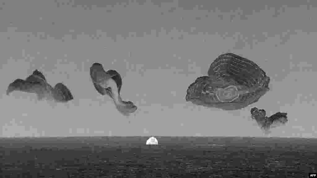 This still image taken from a SpaceX and Polaris broadcast shows the manned Polaris Dawn mission's "Dragon" capsule splashing down off the coast of Dry Tortugas, Florida, completing the first human spaceflight mission&nbsp;by non-government astronauts of the Polaris Program.&nbsp;