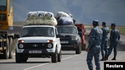 FILE PHOTO: Refugees from Nagorno-Karabakh region arrive in the border village of Kornidzor, Armenia, September 29, 2023