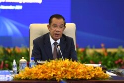 FILE - In this photo provided by An Khoun Sam Aun/Ministry of Information of Cambodia, Cambodian Prime Minister Hun Sen is seen during an online opening session of the Asia-Europe Meeting (ASEM) in Phnom Penh, Cambodia, Nov. 25, 2021.
