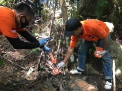 Tim Inafis dari Polres Aceh Selatan saat melakukan indentifikasi terhadap tiga bangkai harimau Sumatera di Desa Ie Buboh, Kecamatan Meukek, Kabupaten Aceh Selatan, Aceh, (Courtesy: BKSDA Aceh)