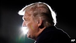 President Donald Trump speaks at a campaign rally at Duluth International Airport, Wednesday, Sept. 30, 2020, in Duluth, Minn. (AP Photo/Alex Brandon)
