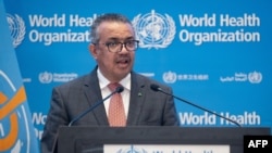 This handout picture made available by the World Health Organization on Nov. 29, 2021 shows WHO Director-General Tedros Adhanom Ghebreyesus addressing the special session of the World Health Assembly in Geneva. 