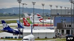 FILE - New Airbus aircrafts wait to be delivered at the Airbus delivery center at Toulouse Blagnac airport, April 30, 2020. 