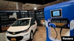 FILE - An official New York State electric car is displayed at the 2019 New York International Auto Show in New York City, April 17, 2019. 