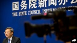 អនុរដ្ឋ​មន្រ្តី​ក្រសួង​ពាណិជ្ជកម្ម​ចិន​លោក Wang Shouwen ថ្លែង​ទៅកាន់​សន្និសីទ​កាសែត​នៅ​ក្នុង​ការិយាល័យ​ទីប្រឹក្សា​ព័ត៌មាន​ទីក្រុង​ប៉េកាំង​កាលពី​ថ្ងៃទី២៨ មិថុនា ឆ្នាំ ២០១៨។