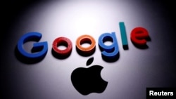 FILE - A Google logo is seen on an Apple MacBook in this illustration taken April 12, 2020. Google lost its last bid to overturn a European Union antitrust penalty on Sept. 10, 2024, while Apple lost its challenge against an order to repay $14.34 billion in back taxes to Ireland.