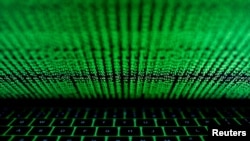 США, Велика Британія та Австралія наклали санкції на лідера кіберзлочинної групи LockBit, росіянина Хорошева. REUTERS/Kacper Pempel/Illustration