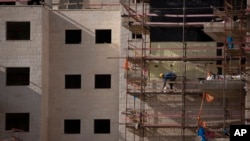 عکس: په فلسطیني سیمو کې د یهودي ښارګوټو جوړول 