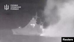 Ukrainian Defence Ministry footage shows what Ukrainian military intelligence said is Russian ship that was damaged by sea drones off Crimea