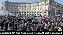 The caskets of Italian ambassador to Democratic Republic of Congo Luca Attanasio and Italian Carabinieri police officer Vittorio Iacovacci are driven away at the end of their funeral, in Rome, Feb. 25, 2021. 