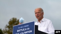FILE - Democratic Presidential Candidate Joe Biden speaks during a voter mobilization event in Atlanta, on Oct. 27, 2020.