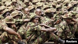 FILE - Members of the Kenya Defense Forces pay their respects to fellow soldiers African Union Mission in Somalia (AMISOM) soldiers, who were killed in El Adde during an attack, at a memorial mass at the Moi Barracks in Eldoret, Kenya, Jan. 27, 2016.