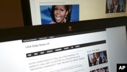 FILE - This photograph taken in Paris Friday Dec. 2, 2016 shows stories from USA Daily News 24, a fake news site registered in Veles, Macedonia. 