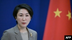 རྒྱ་ནག་ཕྱི་སྲིད་ལྷན་ཁང་གི་མགྲིན་ཚབ་པ་མའོ་ཉིན་