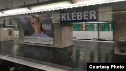 An anti-discrimination poster is seen in a Paris metro station, May 11, 2016. (Credit: Eleanor Beardsley)