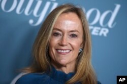 FILE - Karey Burke arrives at The Hollywood Reporter's Women in Entertainment Breakfast at Milk Studios in Los Angeles, Dec. 5, 2018.