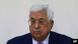 Palestinian President Mahmoud Abbas attends a meeting of the Fatah Revolutionary Council in the West Bank city of Ramallah, March 1, 2018. 
