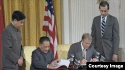 ཁར་ཊར་དང་ཏིན་ཞའོ་ཕིང་།