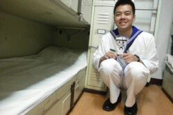 曾于台湾海军服义务役一年的华子琛摄于舰庆