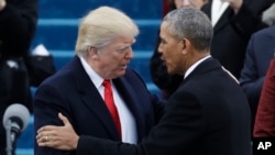 President-elect Donald Trump, left, shakes hands with President Barack Obama before the 58th Presidential Inauguration at the U.S. Capitol in Washington, Jan. 20, 2017.