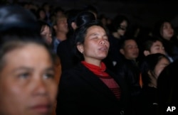 Christians pray as evangelist Franklin Graham preaches in Hanoi, Vietnam.