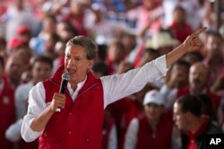 Alfredo Del Mazo, Mexico state gubernatorial candidate for the ruling Institutional Revolutionary Party, or PRI, speaks to supporters during a campaign closing rally in Ecatepec, Mexico state, May 31, 2017. With more than 11 million voters, the state of Mexico is the largest potential prize of three PRI-controlled states holding gubernatorial races.