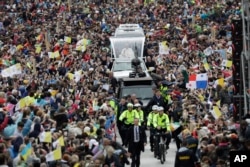 Pope Francis arrives to celebrate Mass at the Phoenix Park in Dublin, Ireland, Sunday, Aug. 26, 2018.