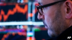 A trader works at the New York Stock Exchange, Jan. 9, 2017.