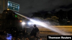 Continúan las manifestaciones exigiendo acción del gobierno, en Bogotá. Foto del miércoles 26 de mayo de 2021.