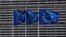 FILE - European Union flags flutter outside the EU Commission headquarters in Brussels, Belgium, May 5, 2021. 