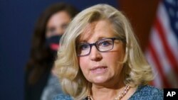 FILE - Rep. Liz Cheney, R-Wyo., the House Republican Conference chair, speaks with reporters following a GOP strategy session on Capitol Hill in Washington, April 20, 2021.