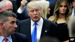 Republican presidential candidate Donald Trump speaks in the spin room after his debate against Democratic presidential candidate Hillary Clinton at Hofstra University in Hempstead, N.Y., Sept. 26, 2016.