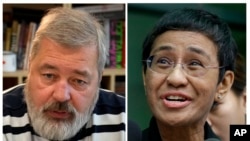 Mhariri wa Novaya Gazeta Dmitry Muratov, kushoto, na Mkurugenzi Mtendaji wa Rappler na Mhariri Mtendaji Maria Ressa. Siku ya Ijumaa, Oktoba 8, 2021 wamepata tuzo ya amani ya Nobeli.