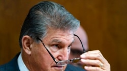 Sen. Joe Manchin, D-W.Va., a key holdout vote on President Joe Biden's domestic agenda, chairs a hearing of the Senate Energy and Natural Resources Committee, at the Capitol in Washington, Oct. 19, 2021.