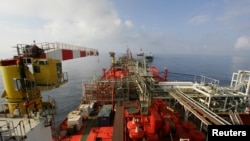FILE - The deck of Bluewater's floating production, storage and offloading vessel Munin, which floats on the Lufeng oil field, 250 kilometers south-east of Hong Kong in the South China Sea.