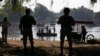 La Guardia Nacional Mexicana vigila el río Suchiate, donde los lugareños transportan carga y personas entre México y Guatemala, cerca de Ciudad Hidalgo, México. Enero 24, 2020.