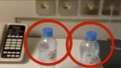 Water bottles are seen in a hotel room where Kremlin critic Alexei Navalny