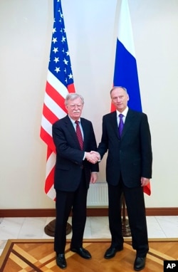 Радник з національної безпеки США Болтон і голова ради безпеки Росії Патрушев, 22 жовтня 2018 року