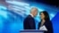 FILE - Democratic presidential candidate former Vice President Joe Biden, left, and then-candidate Sen. Kamala Harris, D-Calif. shake hands after a Democratic presidential primary debate.