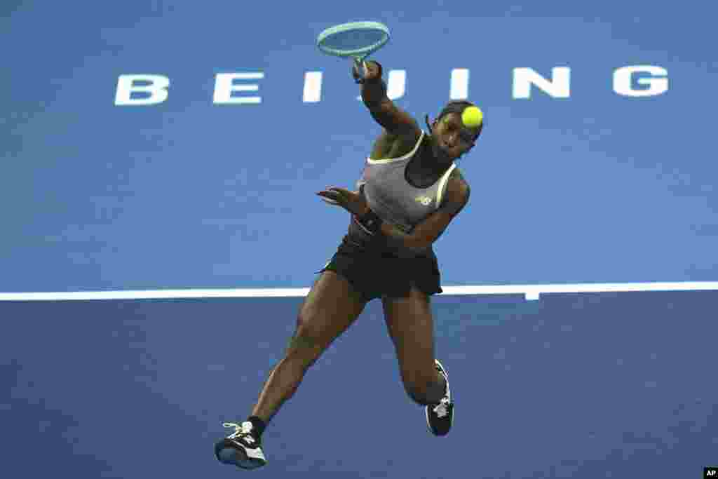 Coco Gauff of the United States returns a shot to Karolina Muchova of Czech Republic during the women's singles final match at the China Open tennis tournament at the National Tennis Center in Beijing.
