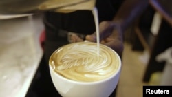 FILE — A cappuccino is prepared at a Nairobi Java House outlet in Nairobi. 