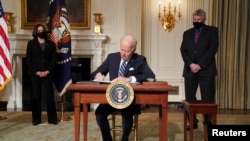 U.S. President Joe Biden signs executive order on Jan 27, 2021