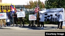 FILE - More than 120 people gathered in front of the U.S. Immigration and Customs Enforcement Office to petition to allow eight Cambodian American who are facing deportation to stay with their family in Minnesota, on Monday, September 26, 2016. (Courtesy of IKARE)
