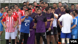 The teams taking part in the 2018 Uyghur American Cup line up before play begins.