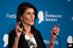FILE - South Carolina Gov. Nikki Haley gestures while speaking at the Federalist Society's National Lawyers Convention, Nov. 18, 2016, in Washington.