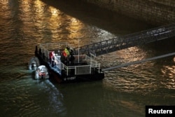 A rescue boat is seen on the Danube river after a tourist boat capsized in Budapest, Hungary, May 30, 2019.