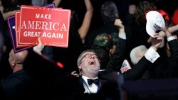 Pristalica kandidata republikanaca Donalda Trampa dok prati izborne rezultate u Njujorku (AP Photo/John Locher)