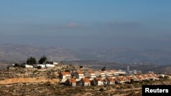 A picture shows homes near the Israeli outpost of Palgey Maim, in the occupied West Bank, Feb. 6, 2017.