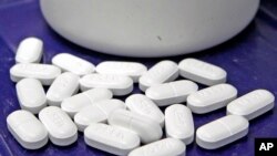 FILE - Hydrocodone pills are pictured at a pharmacy in Montpelier, Vt.
