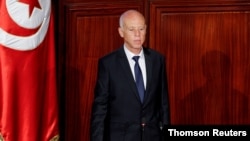 FILE PHOTO: Tunisian President Kais Saied takes the oath of office in Tunis
